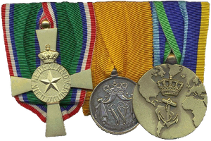 On June 6, 1983, I was awarded the silver medal for long, honest and faithful military service for 24 years. (The medal in the middle) With the accompanying batton.